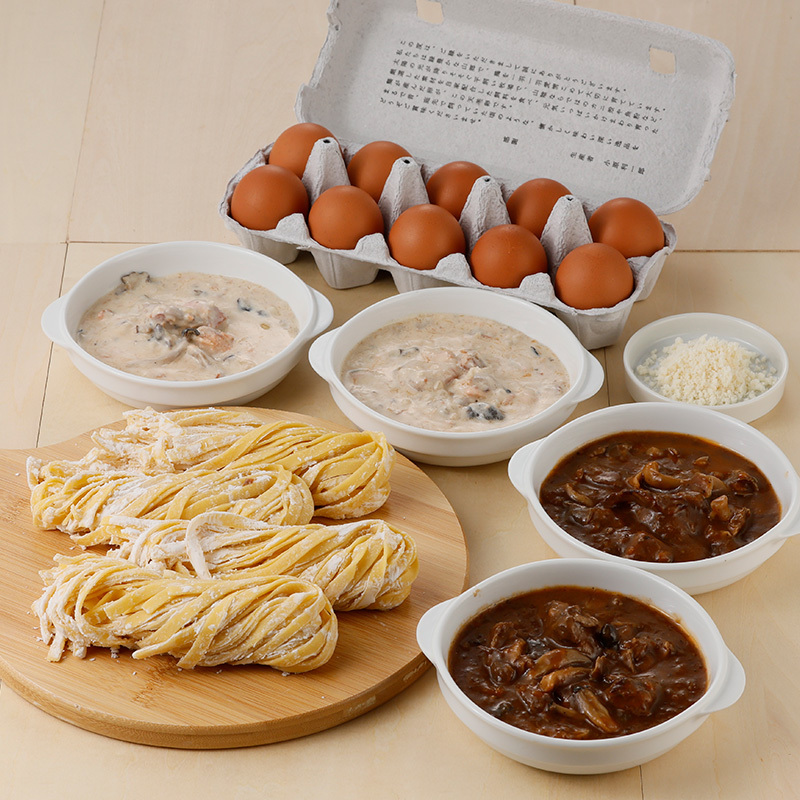 境港サーモンのクリームパスタと鳥取和牛の牛すじラグーパスタの2種類に天美卵を詰め合わせ