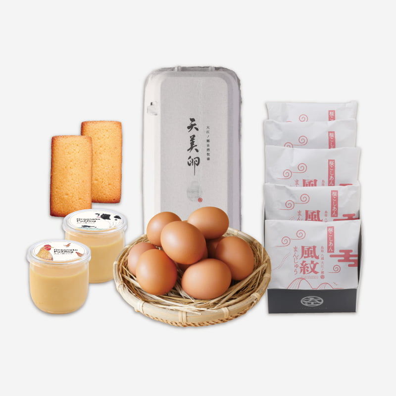春限定の桜こしあんの風紋まんじゅうに、牧場人気のぷりんとフィナンシェ、朝採れ新鮮な天美卵を詰め合わせた送料込みセット。